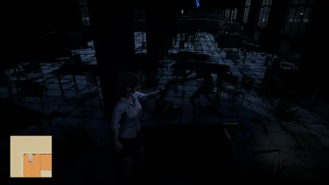 Vy with her torch in a dark classroom